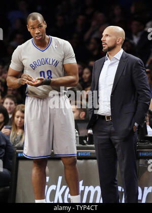 Brooklyn Nets head coach Jason Kidd puts Jason Collins in the game in the final minutes against the Cleveland Cavaliers at Barclays Center in New York City on March 28, 2014.The Nets defeated the Cavaliers 108-97.     UPI/John Angelillo Stock Photo