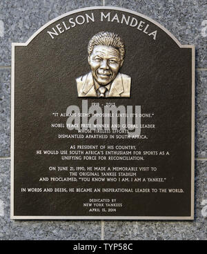 A plaque honoring the late South African President Nelson Mandela is  unveiled in Monument Park on Jackie Robinson Day in game 2 of a double header against the Chicago Cubs at Yankee Stadium in New York City on April 16, 2014.   New York Yankees All Rights Reserved/  UPI Stock Photo