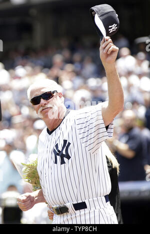Retired New York Yankee pitcher Goose Gossage tips his cap while