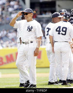 Retired New York Yankee player Hideki Matsui smiles at batting practice at  the 68th Annual Old-Timers' Day before the New York Yankees play the  Baltimore Orioles at Yankee Stadium in New York