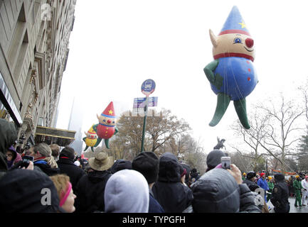 Balloons float down the parade route at the 88th Macy's Thanksgiving Day Parade in New York City on November 27, 2014.     UPI/John Angelillo Stock Photo