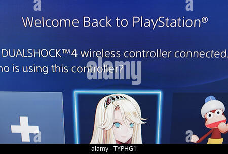 A Welcome back to PlayStation messages appears when A PS4 unit is powered on before trying to connect to the online service in New York City on December 26, 2014. The online gaming networks for Sony's PlayStation and Microsoft's Xbox consoles are down in what hackers said was a coordinated attack. The disruption started Christmas Day.    UPI/John Angelillo Stock Photo