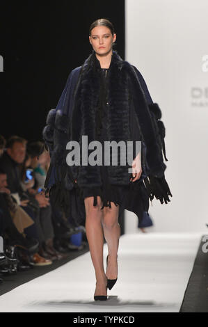 A model walks on the runway at the Dennis Basso fashion show during Mercedes-Benz Fashion Week Fall 2015 at Lincoln Center in New York City on February 16, 2015. February's New York Fashion Week will be the last one held at Lincoln Center.       Photo by Andrea Hanks/UPI Stock Photo