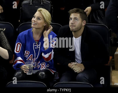 Margot Robbie and Tom Ackerley at NY Rangers Game