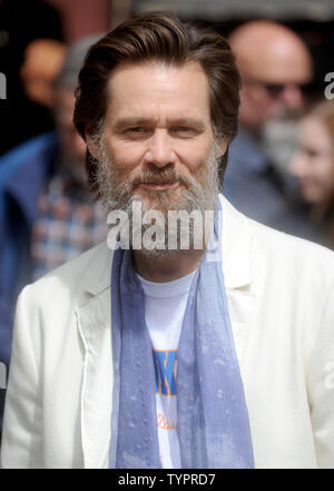 Jim Carey arrives at the backstage entrance before the final taping of the 'Late Show,' with David Letterman at The Ed Sullivan Theater in New York City on May 20, 2015. Letterman taped his farewell episode of 'The Late Show' on Wednesday afternoon, then walked backstage as the Foo Fighters closed out the show with a performance of 'Everlong.'      Photo by Dennis Van Tine/UPI Stock Photo