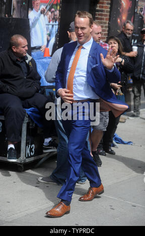 Peyton Manning arrives at the backstage entrance before the final taping of the 'Late Show,' with David Letterman at The Ed Sullivan Theater in New York City on May 20, 2015. Letterman taped his farewell episode of 'The Late Show' on Wednesday afternoon, then walked backstage as the Foo Fighters closed out the show with a performance of 'Everlong.'       Photo by Dennis Van Tine/UPI Stock Photo