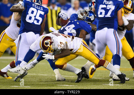 New York Giants safety Trenton Thompson (39) greets New England