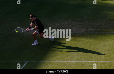 Devonshire Park, Eastbourne, UK. 26th June, 2019. Nature Valley International Tennis Tournament; Cameron Norrie (GBR) plays a backhand shot against Kyle Edmund (GBR) Credit: Action Plus Sports/Alamy Live News Stock Photo