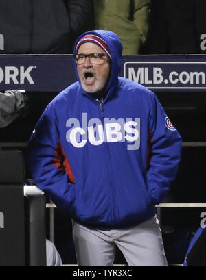 Chicago Cubs manager Joe Maddon shouts at home plate umpire Tim Timmons after a called strike on Cubs batter Anthony Rizzo while playing the New York Mets in the sixth inning of game 2 of the NLCS at Citi Field in New York City on October 18, 2015.    Photo by Ray Stubblebine/UPI Stock Photo