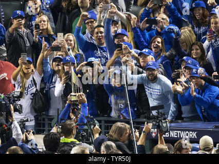 Kansas City Royals fans celebrate after the Royals defeated the Houston  Astros in game 5 of the American League Division Series at Kauffman Stadium  in Kansas City, Missouri on October 14, 2015.