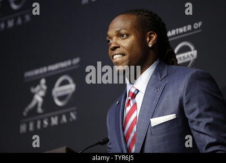 Alabama running back Derrick Henry speaks at a press conference after winning the 2015 Heisman Trophy Award at the Marriott Marquis in New York City on December 12, 2015. Stanford running back Christian McCaffrey and Clemson quarterback Deshaun Watson are the other finalists.    Photo by John Angelillo/UPI Stock Photo