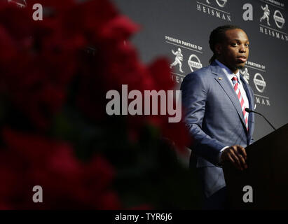 Alabama running back Derrick Henry speaks at a press conference after winning the 2015 Heisman Trophy Award at the Marriott Marquis in New York City on December 12, 2015. Stanford running back Christian McCaffrey and Clemson quarterback Deshaun Watson are the other finalists.    Photo by John Angelillo/UPI Stock Photo