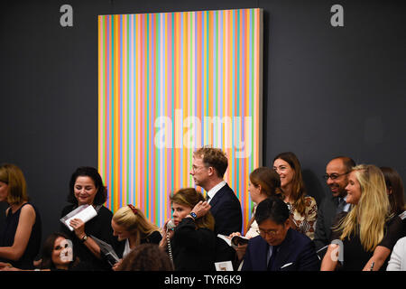London, UK.  26 June 2019. ''Bright Shade'' by Bridget Riley, (Est. £600,000 - 800,000) sold for a hammer price of £880,000 at Sotheby's Contemporary Art Evening Sale in their New Bond Street galleries.  Credit: Stephen Chung / Alamy Live News Stock Photo