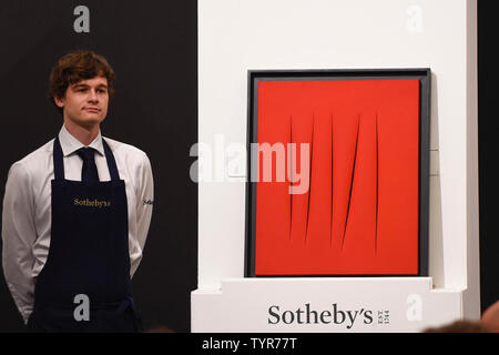 London, UK.  26 June 2019. ''Concetto Spaziale, Attese'' by Lucio Fontana, (Est. £1,800,000 - 2,500,000) ) sold for a hammer price of £2,000,000 at Sotheby's Contemporary Art Evening Sale in their New Bond Street galleries. Credit: Stephen Chung / Alamy Live News Stock Photo