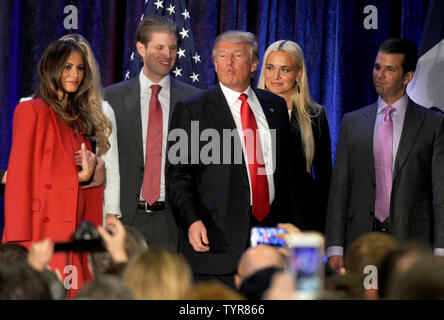 Melania Trump, Lara Yunaska, Eric Trump, Vanessa Haydon and Donald Trump Jr. stand with Republican presidential candidate Donald Trump speak after coming in second place at his Iowa Caucus night gathering on February 1, 2016 in Des Moines, Iowa. Sen. Ted Cruz has won the Iowa Republican Caucus.     Photo by Dennis Van Tine/UPI Stock Photo