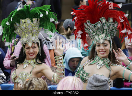 Rio Carnival themed showgirls escort 2016 American Olympic athletes to the stage at the Citi Concert Series on TODAY at Rockefeller Center in New York City on April 27, 2016. Today is the 100 days to Rio countdown ahead of the Rio 2016 Olympic Games summer games that will take place in Rio de Janeiro, Brazil.  Photo by John Angelillo/UPI Stock Photo