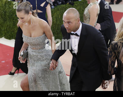 Hannah Davis and Derek Jeter attend the Manus x Machina: Fashion in an Age  of Technology Costume Institute Benefit Gala at Metropolitan Museum of Art  on May 2, 2016 in New York