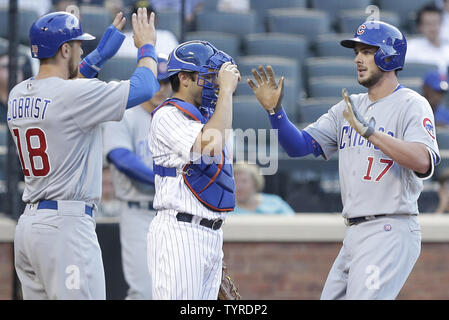 Chicago Cubs Kris Bryant celebrates with Ben Zobrist after he hits a 2-run home run in the first inning against the New York Mets at Citi Field in New York City on June 30, 2016.      Photo by John Angelillo/UPI Stock Photo