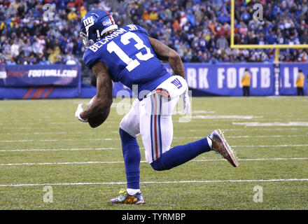 New York Giants Odell Beckham Jr. celebrates in the end zone after catching  a 87 yard touchdown pass in the first quarter against the New England  Patriots at MetLife Stadium in East