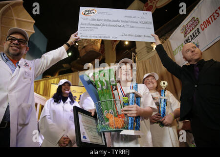 Connor Slocombe from Alaska puts the golden sneaker trophy around his neck after winning the 42nd annual National Odor-Eaters Rotten Sneaker Contest at Ripley's Believe It or Not in New York City on March 28, 2017. The Rotten Sneaker Contest began in 1974 as a promotion created by a Montpelier Vermont sporting goods owner who wanted to advertise a new line of athletic shoes.    Photo by John Angelillo/UPI Stock Photo