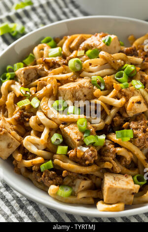 Homemade Japanese Mapo Tofu Udon Noodles Bowl Stock Photo