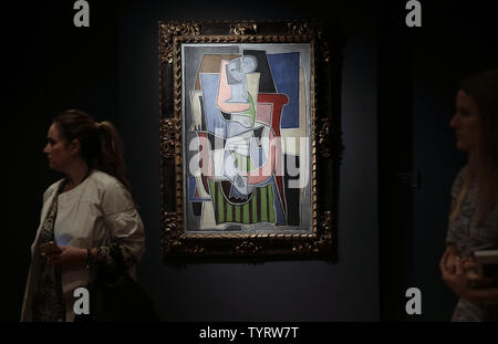 Pablo Picasso's 'Femme assise dans un fauteuil' is on display at a media preview for the Impressionist and Modern Art as well as the Post-War and Contemporary art sales at Christie's in New York City on May 5, 2017.       Photo by John Angelillo/UPI Stock Photo