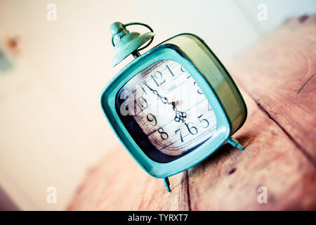 Rustic clock - vintage old fashioned clock Stock Photo