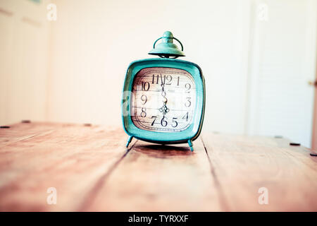 Rustic clock - vintage old fashioned clock Stock Photo