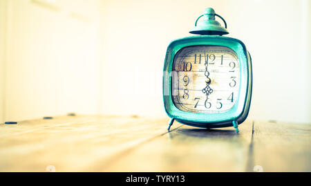 Rustic clock - vintage old fashioned clock Stock Photo