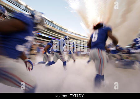 New York Giants players take the field before the preseason game against the New York Jets at MetLife Stadium in East Rutherford, New Jersey on August 26, 2017.    Photo by John Angelillo/UPI Stock Photo