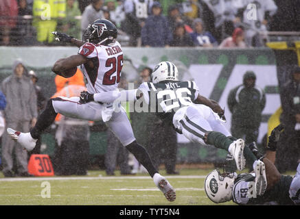 NJP2000010201 - 02 JANUARY 2000 - EAST RUTHERFORD, NEW JERSEY, USA: New  York Jets CB Marcus Coleman (42) tries to break up a compleation intended  for Seattle Seahawks WR Sean Dawkins (81).