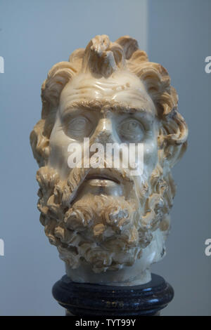 Head of Marsyas. Roman marble copy after a Greek original from 150-100 BC on display in the Altes Museum in Berlin, Germany. The head was found in the Baths of Caracalla (Terme di Caracalla) in Rome, Italy. Stock Photo