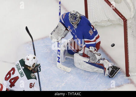 Minnesota Wild Mikael Granlund scores a goal New York Rangers Alexandar Georgiev in the first period at Madison Square Garden in New York City on February 23, 2018.     Photo by John Angelillo/UPI Stock Photo