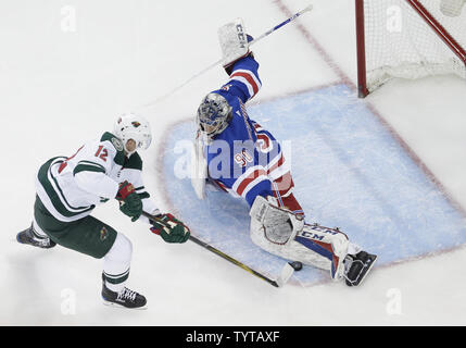 New York Rangers Alexandar Georgiev makes a save on a shot from Minnesota Wild Eric Staal in the first period at Madison Square Garden in New York City on February 23, 2018.     Photo by John Angelillo/UPI Stock Photo