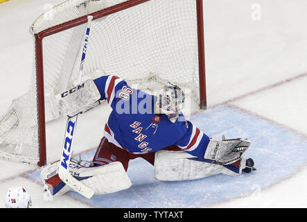 New York Rangers Alexandar Georgiev makes a save in the second period against the Minnesota Wild at Madison Square Garden in New York City on February 23, 2018.     Photo by John Angelillo/UPI Stock Photo