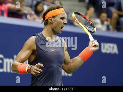 Rafael Nadal of Spain returns a ball in his quarterfinal match against Dominic Thiem of Austria in Arthur Ashe Stadium at the 2018 US Open Tennis Championships at the USTA Billie Jean King National Tennis Center in New York City on September 4, 2018.      Photo by John Angelillo/UPI Stock Photo