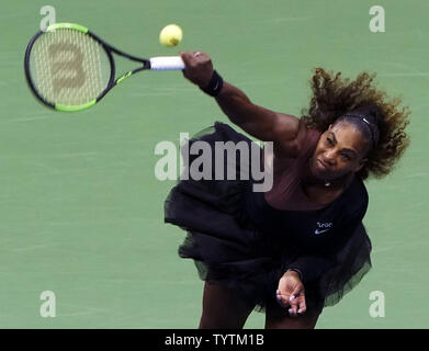 Serena Williams of the United States serves to Naomi Osaka of Japan in their Woman's Singles Final match in Arthur Ashe Stadium at the 2018 US Open Tennis Championships at the USTA Billie Jean King National Tennis Center in New York City on September 8, 2018.      Photo by Ray Stubblebine/UPI Stock Photo