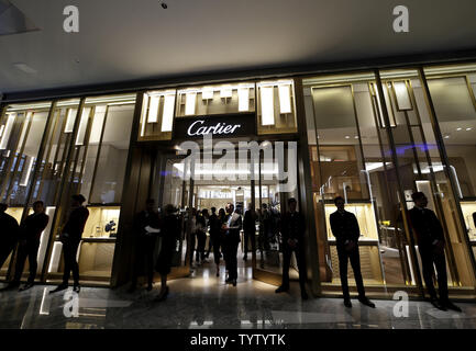 Attendees walk by Cartier at the Grand Opening of Hudson Yards in