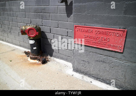 standpipe and steamer connection to sprinklers on an old building in Chicago IL USA Stock Photo