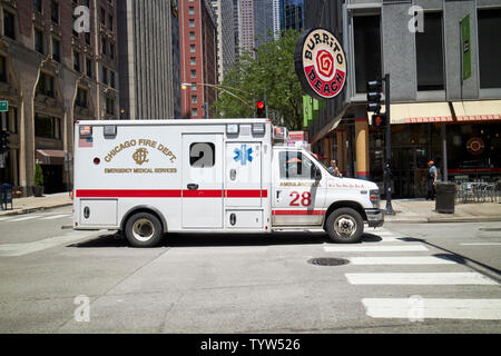 Chicago Fire Department emergency ambulance on call in downtown Chicago IL USA Stock Photo