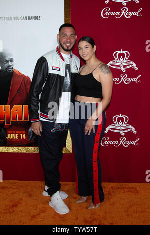 Chicklet and Maleni Cruz arrive on the red carpet at the premiere of