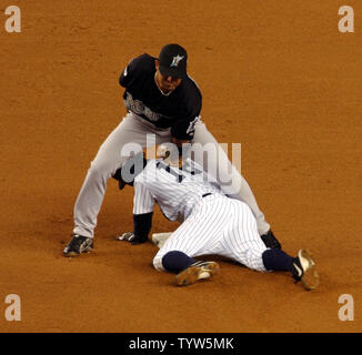 The Florida Marlins celebrate their 3-2 win over the New York Yankees in  Game 1 of the World Series at Yankee Stadium on October 18, 2003.  (UPI/Roger L. Wollenberg Stock Photo - Alamy