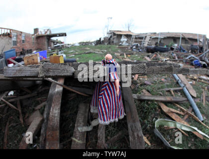 A path of destruction is seen in the aftermath of a series of tornadoes ...