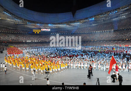 Yao Ming carries the flag as he leads the Chinese Olympic team into the National Stadium, called the Bird's Nest, during the Opening Ceremony of the 2008 Summer Olympics in Beijing on August 8, 2008.   The Summer Games will run through August 24, 2008.   (UPI Photo/Pat Benic) Stock Photo