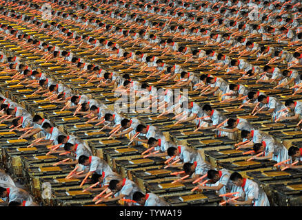 The pageantry of the Olympics is shown with thousands of drummers tapping out a lit signal during a dress rehearsal of the Opening Ceremony of the 2008 Summer Olympics at the National Stadium, called the Bird's Nest, in Beijing on August 5, 2008.  The Summer Games begin with the Opening Ceremony on August 8, 2008, and will run through August 24, 2008.   (UPI Photo/Pat Benic) Stock Photo