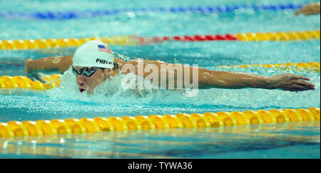 USA's Michael Phelps glides through the water during the butterfly portion of Heat 5 of the Men's 400M Individual Medley at the National Aquatics Center at the Summer Olympics in Beijing on August 9, 2008. Phelps set an Olympic record of 4:07.82. The finals are tomorrow and Phelps is expected to win the gold medal en route to a possible eight gold medals.   (UPI Photo/Roger L. Wollenberg) Stock Photo