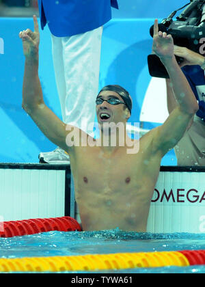 USA's Michael Phelps jubilates after setting a World Record of 4:03.84 in the  Men's 400M Individual Medley Final at the National Aquatics Center at the Summer Olympics in Beijing on August 10, 2008.  Phelps won the first of a possible eight gold medals at the games.    (UPI Photo/Pat Benic) Stock Photo