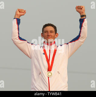 Britain's David Florence, ranked fourth in the world, celebrates on the medal podium after winning the silver in the Olympic men's Canoe Single (C1) final in the Canoe/Kayak Slalom Racing event in Beijing on August 12, 2008.  Florence won the sliver with a time of 178.61 seconds.   (UPI Photo/Stephen Shaver) Stock Photo