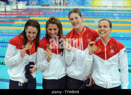 USA's bronze medal winners (L-R) Katie Hoff, Caroline Burckle, Allison Schmitt and Natalie Coughlin show their medals during the awards ceremony for the 4x200 meter Freestyle Relay event at the National Aquatics Center at the Summer Olympics in Beijing on August 14, 2008.  The Australian team won and set a World Record of 7:44.31.   (UPI Photo/Pat Benic) Stock Photo