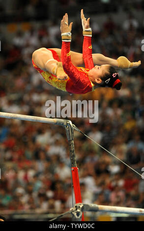 Chinese gymnast He Kexin performs her routine on the uneven bars during the Women's Uneven Bars Final at the National Indoor Stadium, August 18, 2008, at the Summer Olympics in Beijing, China. He was tied with American gymnast Nastia Liukin after their performances, and the judges awarded the gold medal to He, the silver to Liukin and China's Yang Yilin won the bronze.      (UPI Photo/Mike Theiler) Stock Photo